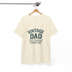 “Vintage Dad Still in Mint Condition – Funny Father’s Day Graphic Unisex Heavy Cotton T-Shirt, Retro Dad Gift Tee for Birthday, Father’s Day and other Holidays