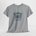 “Vintage Dad Still in Mint Condition – Funny Father’s Day Graphic Unisex Heavy Cotton T-Shirt, Retro Dad Gift Tee for Birthday, Father’s Day and other Holidays
